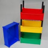 stacking bins in blue, green, red and yellow.