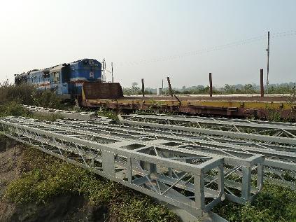 Representative picture depicting a Pole erected in another corridor Flat wagon used for transporting the poles Erection of Overhead Lines 8.