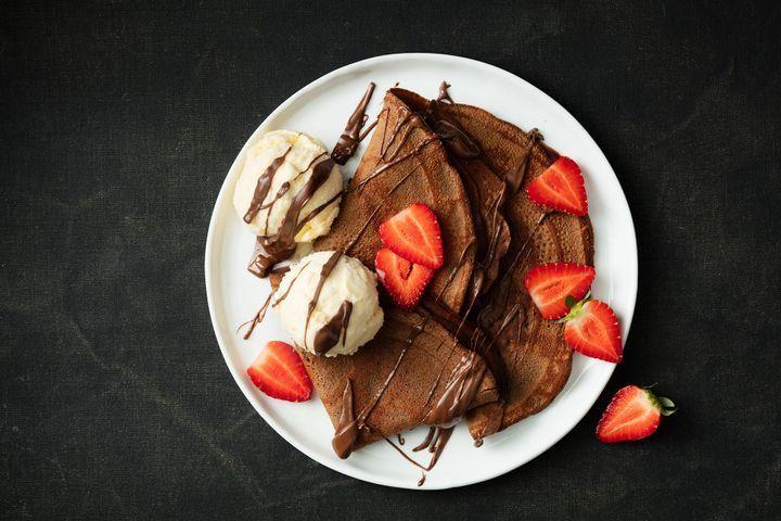 Recipe of the Month : Ingredients: - 75g (1/2 cup) self-raising flour - 3 eggs - 150g (1/2 cup) Nutella, plus extra, warmed, to serve - Vanilla ice-cream, to serve (optional) - Sliced strawberries,