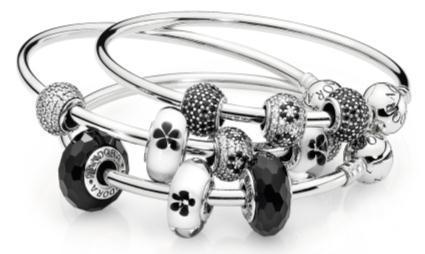 silver bangle), with only half the number of DVs The PANDORA ESSENCE COLLECTION performs well helped by new charms and bracelets