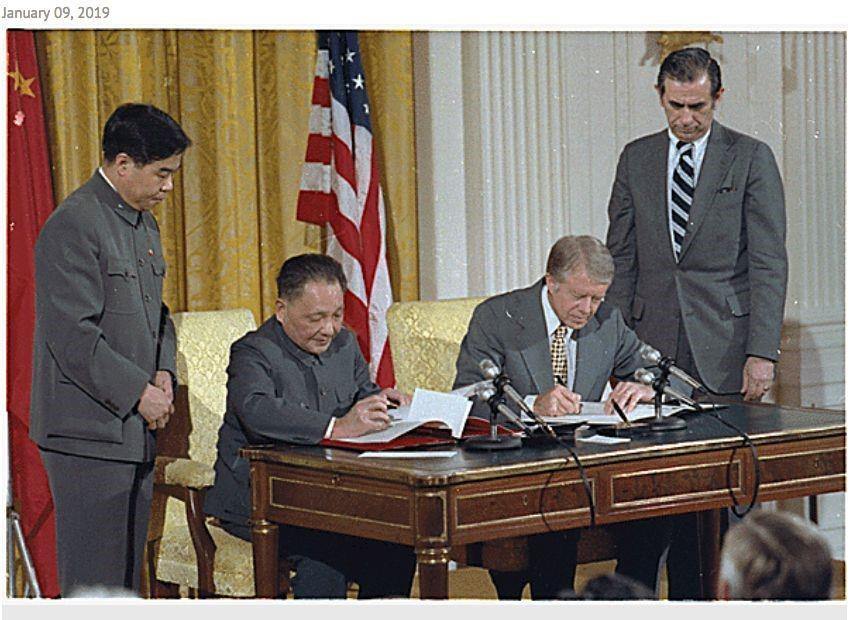 President Carter and Deng Xiaoping signing the